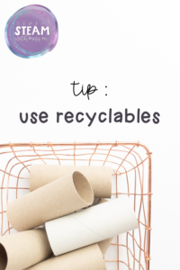 Image shows a metal basket with cardboard tubes and reads "tip: use recyclables"